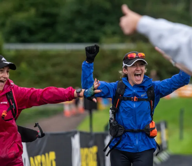 Women celebrating at finish