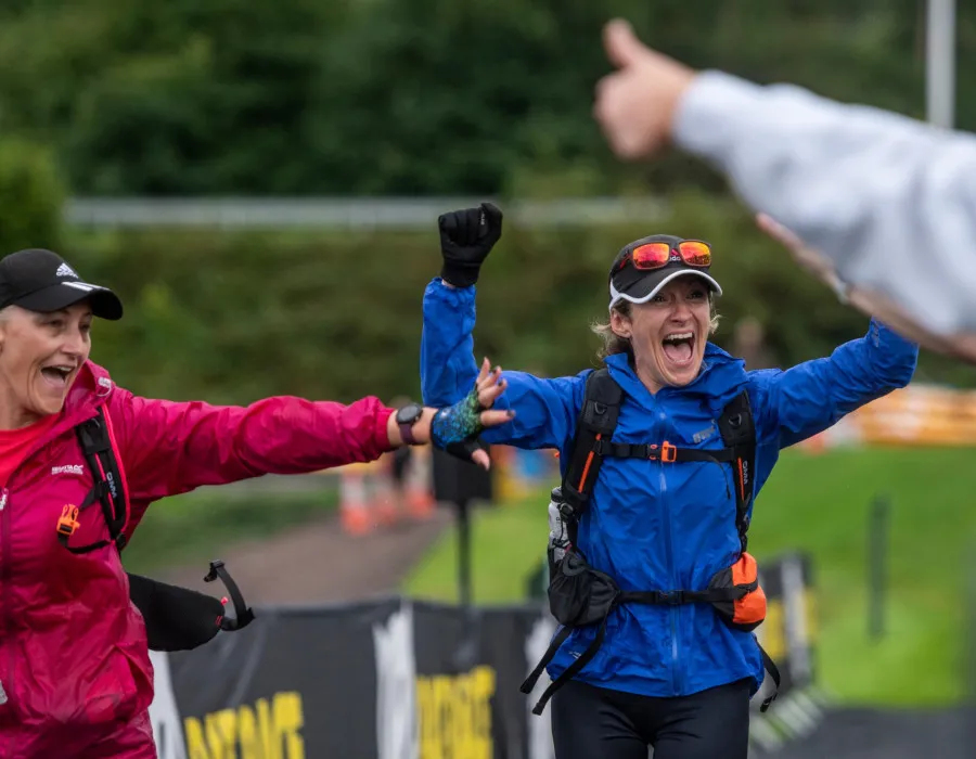 Women celebrating at finish